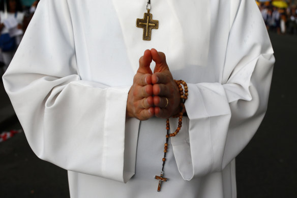 A catholic clergyman.