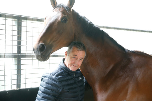 Lindsey Smith at his stables in Warrnambool with Black Heart Bart.