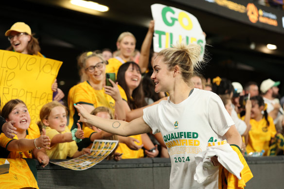 Matildas star Ellie Carpenter thanks fans at Marvel Stadium after the win over Uzbekistan in February.