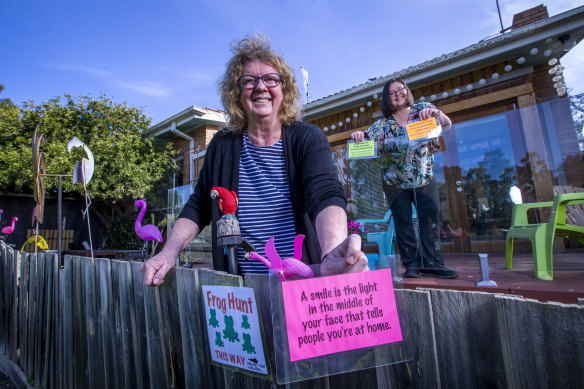 Lee Smith-Moir and daughter Tai  try to cheer up the neighbourhood.