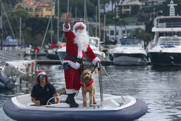 Santa and “Rudolph” visited the Sydney to Hobart race’s international yachts at Rushcutters Bay on Christmas Day.