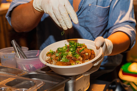 Stalls from UNESCO-certified Singaporean hawker centres in a stylish setting.