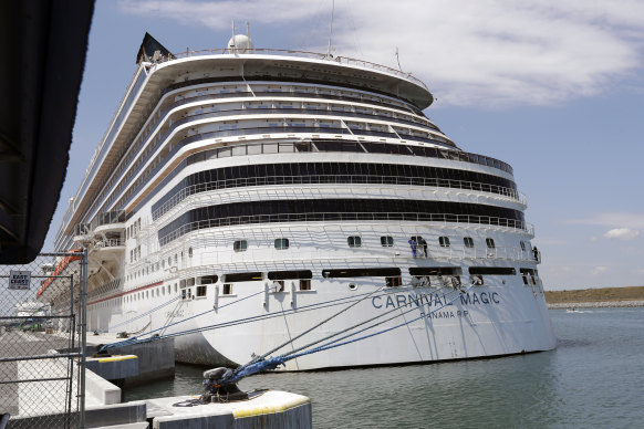 Cruise lines such as Carnival, whose ship Carnival Magic is pictured docked at Port Canaveral in Florida, have been on the frontline of the pandemic’s economic fallout.