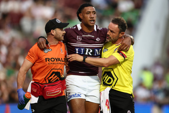 Taniela Paseka was helped from the field.