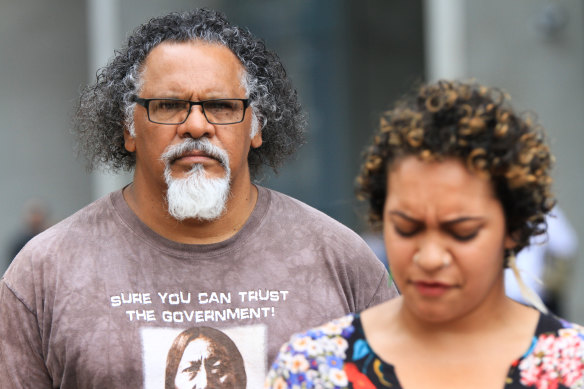 Murrawah Johnson and her uncle, Wangan and Jagalingou traditional owner and council spokesperson Adrian Burragubba, speak outside the Brisbane Supreme Court after launching another challenge to the Adani Carmichael mine.