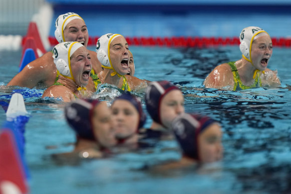 The Stingers celebrate after winning their semi-final nail-biter.