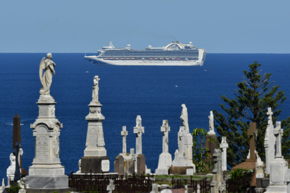The Ruby Princess sits off the Sydney coastline in April.