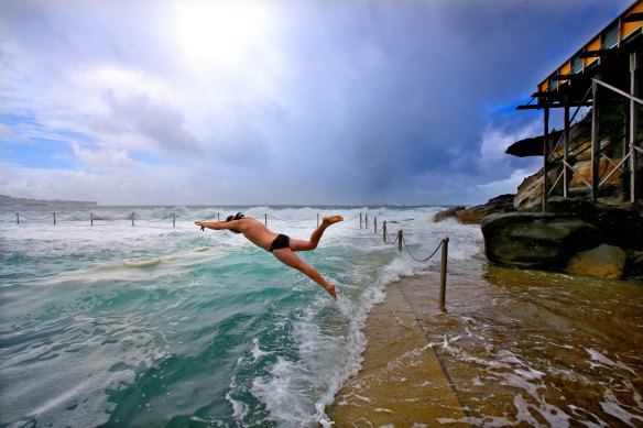 A swimmer cools off on a sultry summer’s day.