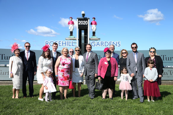 The Ingham family pose in front of the winning post at Rosehill on Saturday.