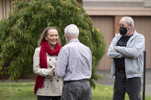 Labor candidate Mary Doyle greets voters.