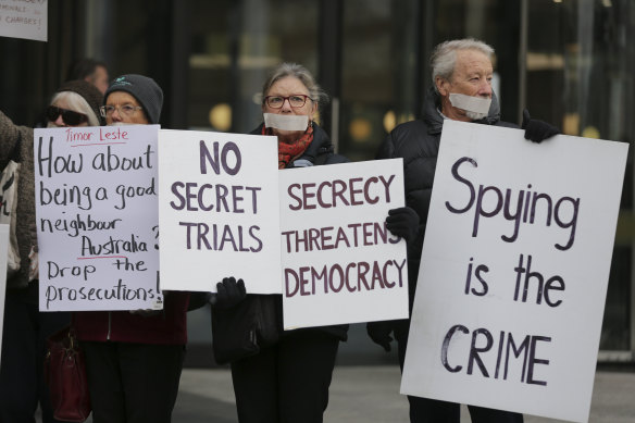 Protesters supporting Witness K’s former lawyer Bernard Collaery in front of the Law Courts in 2019.