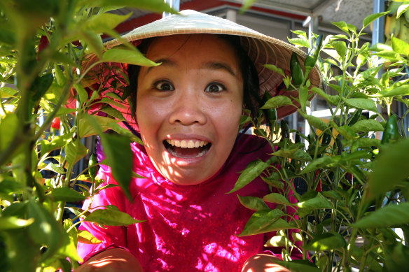 Diana Nguyen in character as her mother.