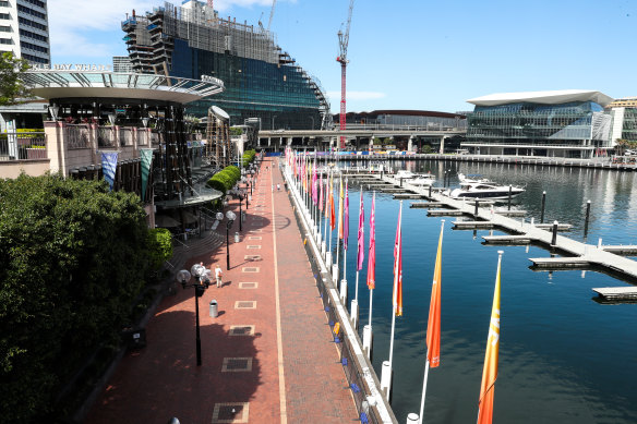Darling Harbour is empty on Friday at lunchtime.