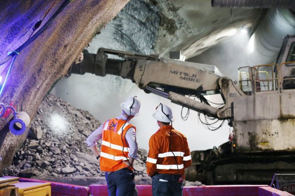 Transport Minister Mark Bailey inspects work on Cross River Rail’s underground train station at Roma Street. 