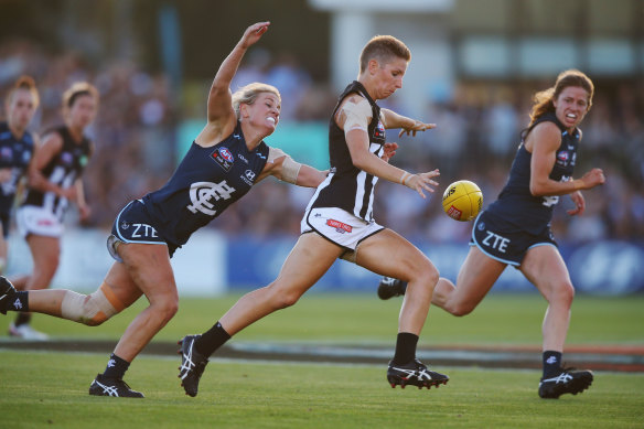Emma Grant in action for Collingwood in the first AFLW game.