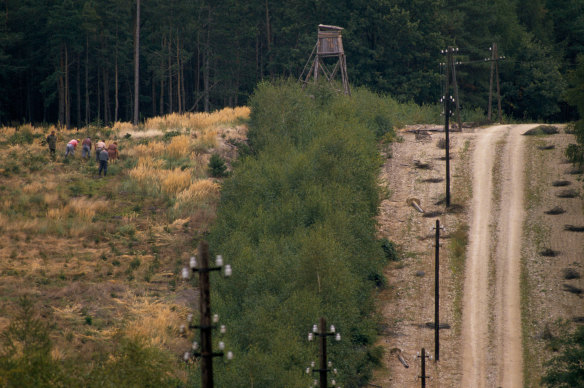 The Iron Curtain being dismantled near Sopron, Hungary, in 1989.