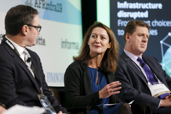 Transport Asset Holding Entity chief executive Benedicte Colin, centre, earns almost as much as Transport for NSW secretary Rob Sharp.