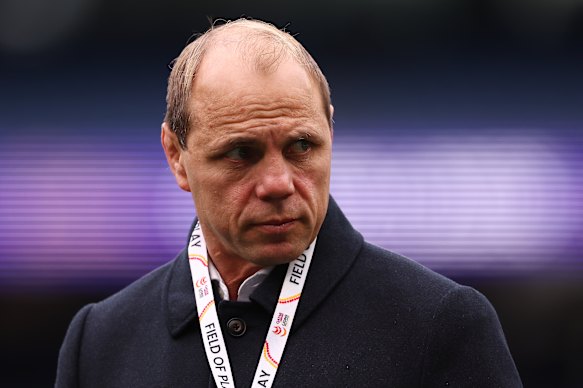 Rugby Australia chief executive Phil Waugh watches on. 