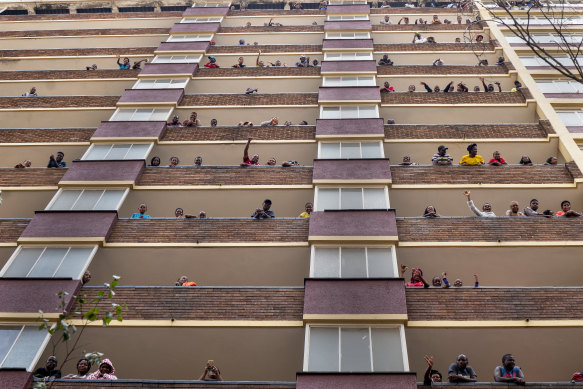 Residents of the densely populated Hillbrow neighbourhood of Johannesburg are confined to their apartments in an attempt to prevent the spread coronavirus.