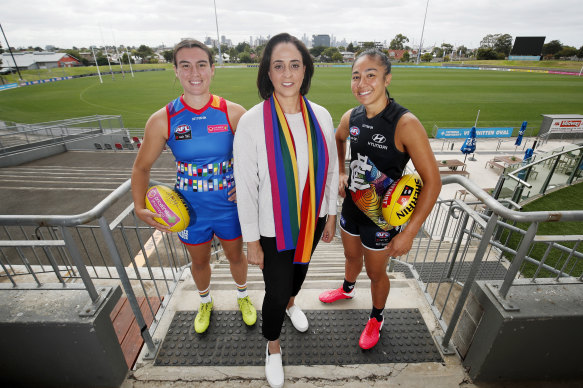 Bulldog Bonnie Toogood and Carlton’s Darcy Vescio with AFLW boss Nicole Livingstone. The Friday night fixture will stay the same.