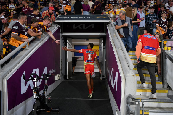 Hamiso Tabuai-Fidow walks down the tunnel after leaving the field for the Dolphins injured against the Brisbane Broncos.