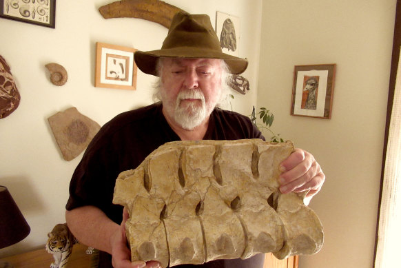 Michael Durrant with a fossil from the spine of a spinosaurus, which would have featured in the Gulgong museum.