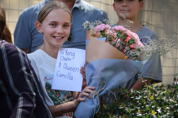 Chloe Barnett, 12, with a letter to  King Charles and Queen Camilla as they attend a church service at St Thomas’ Anglican Church.