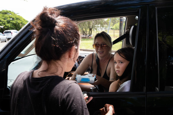 A mother and daughter drive around Wardell offering sushi and brownies to residents.