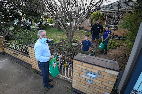 Paul Briggs delivering groceries to his family who are isolating for 14 days. 