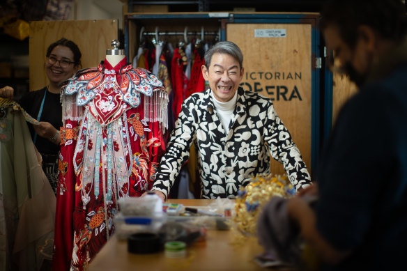 <i>The Butterfly Lovers</i> director Ivan Heng, pictured with the Zhu Yingtai wedding gown by designer Max Tan.