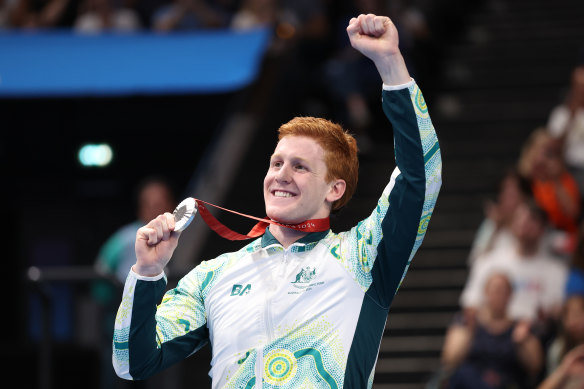 Col Pearse celebrates his silver medal.