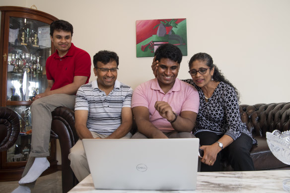 Thinesshan Thevathasan receives his ATAR results with his brother Amerthan, father Nadarajah and mother Sivakumari.