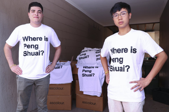 Drew Pavlou, left, and Max Mok show some of the shirts they had printed up ahead of the Australian Open in January with the slogan Where is Peng Shuai?