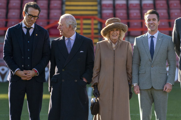 King Charles III and Camilla, Queen Consort meet with Co-Owners of Wrexham AFC, Ryan Reynolds and Rob McElhenney during their visit to Wrexham Association Football Club.