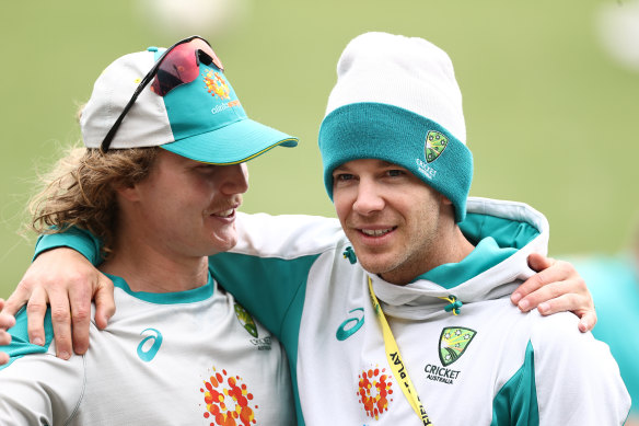 Tim Paine and Will Pucovski at training in Sydney earlier this year.