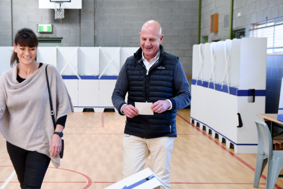 Tasmanian Premier Peter Gutwein and his wife Mandy voting at the East Launceston Primary School Parents and Friends Association Pavilion in Launceston, Saturday, May 1, 2021.