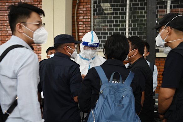 A Chinese delegation arrives at Maharajgunj to identify the bodies of Chinese nationals.