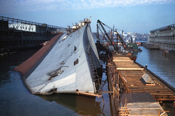 SS Normandie meets her maker – she had managed to complete 139 transatlantic voyages.