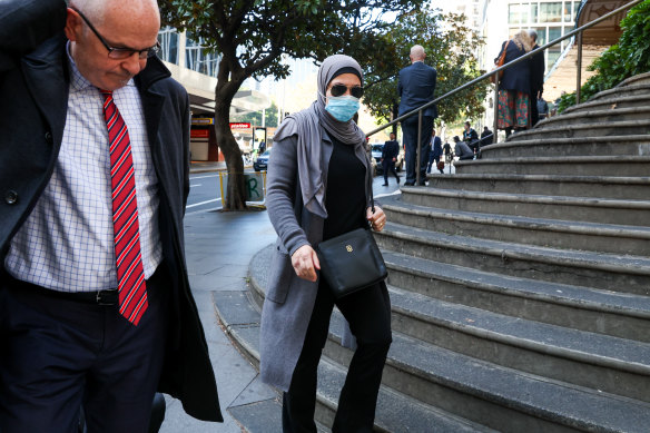 Mariam Hamade leaves Downing Centre District Court with her lawyer  Michael Blair (left).