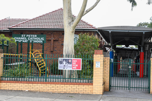 St Peter Chanel Primary School at Regents Park is one of two schools linked to a cluster of Omicron cases in south-west Sydney.