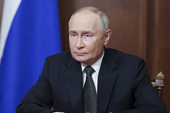 Putin addresses the nation from the Kremlin in Moscow.