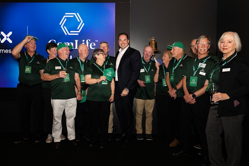 Gemlife chief executive Adrian Puljich with Gemlife residents at the ringing of the bell as the stock made its ASX debut.