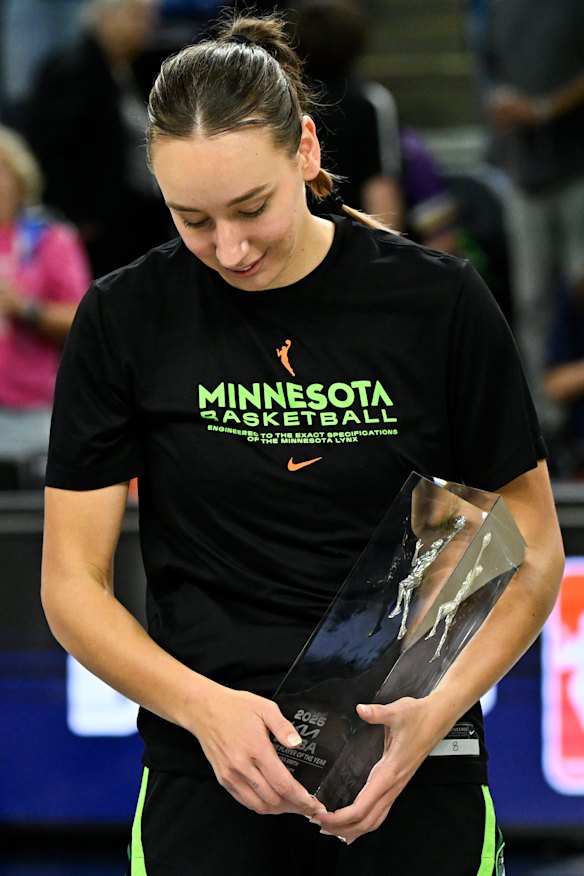 Alanna Smith receives her trophy for being co-defensive player of the year.