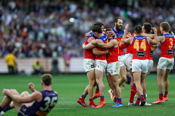 Brisbane Lions win a nail-biter grand final against the Fremantle Dockers at the MCG.