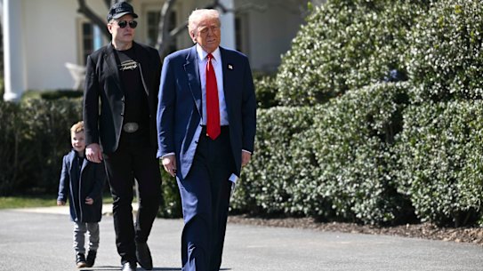 US President Donald Trump, Elon Musk and son X Æ A-Xii at the White House last month.