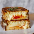 Three-cheese toastie with warrigal greens, kimchi and tomato.