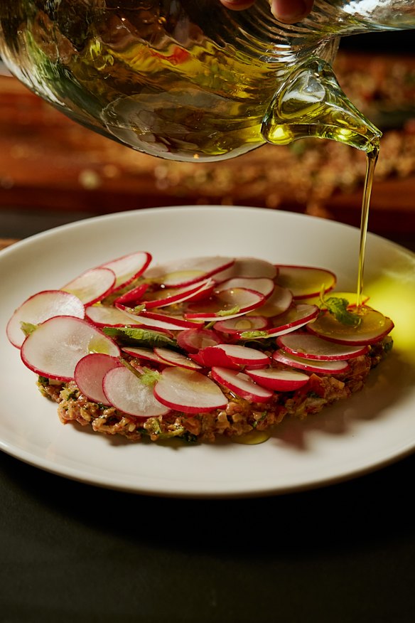 Kafta nayeh (raw lamb dressed with toum, chilli and herbs).