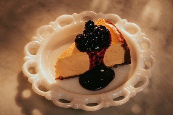 A formidable wodge of New York cheesecake with blueberry sauce.