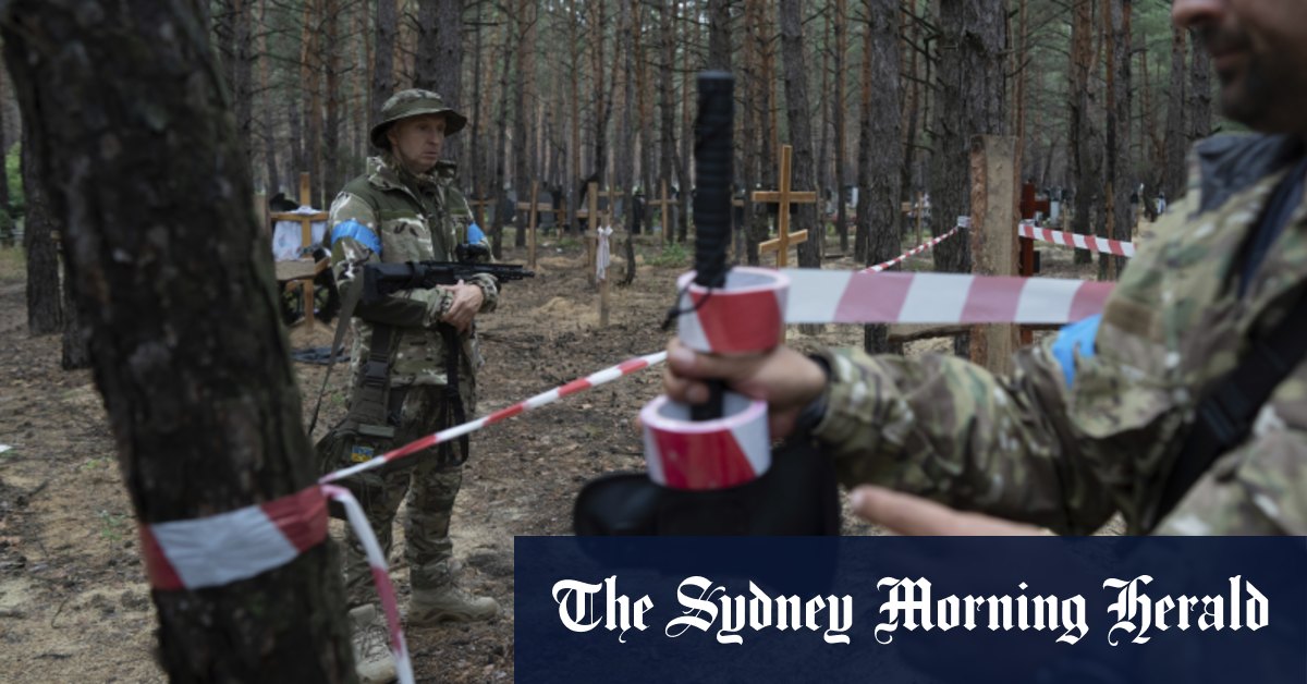 Ukraine finds a mass grave in recaptured city of Izium – Sydney Morning Herald