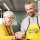 Founder of OzHarvest, Ronni Kahn AO, and Atlassian co-founder Mike Cannon-Brookes in the Atlassian office kitchen. 